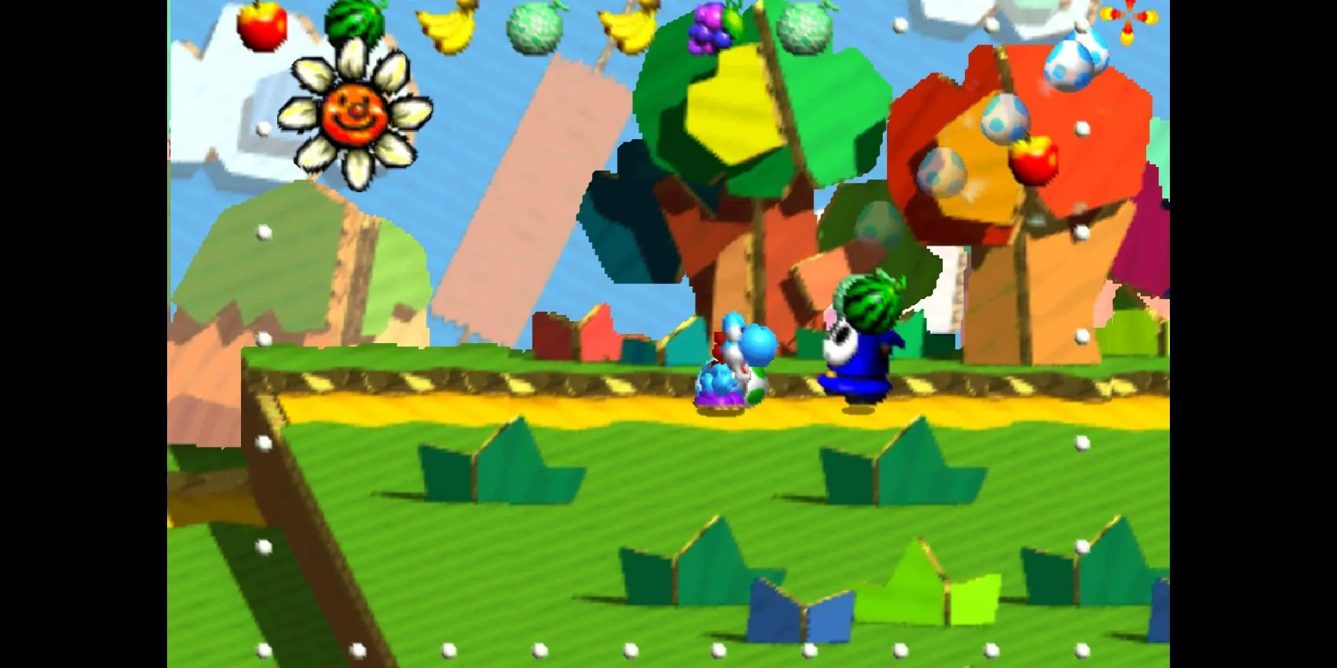 Ảnh chụp màn hình Yoshi trong game Yoshi's Story đang thực hiện động tác ném trứng.
