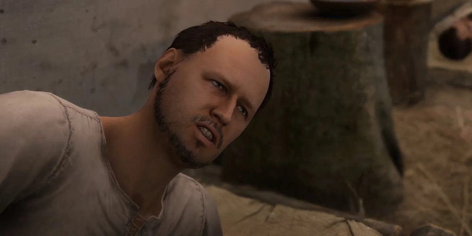 Black đang nằm trên giường bệnh và tỏ vẻ khó chịu trong một bệnh xá ở Kingdom Come Deliverance 2