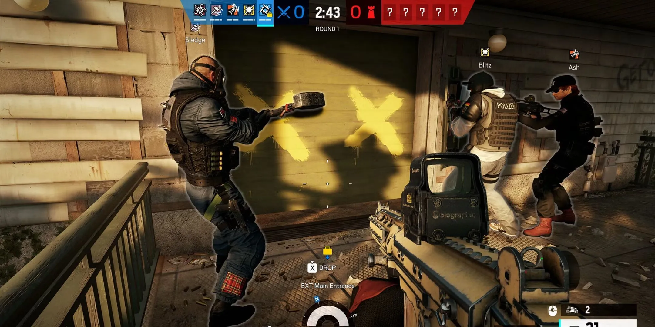 Đội đặc nhiệm Rainbow Six Siege chuẩn bị phá cửa đột kích trong một trận đấu căng thẳng