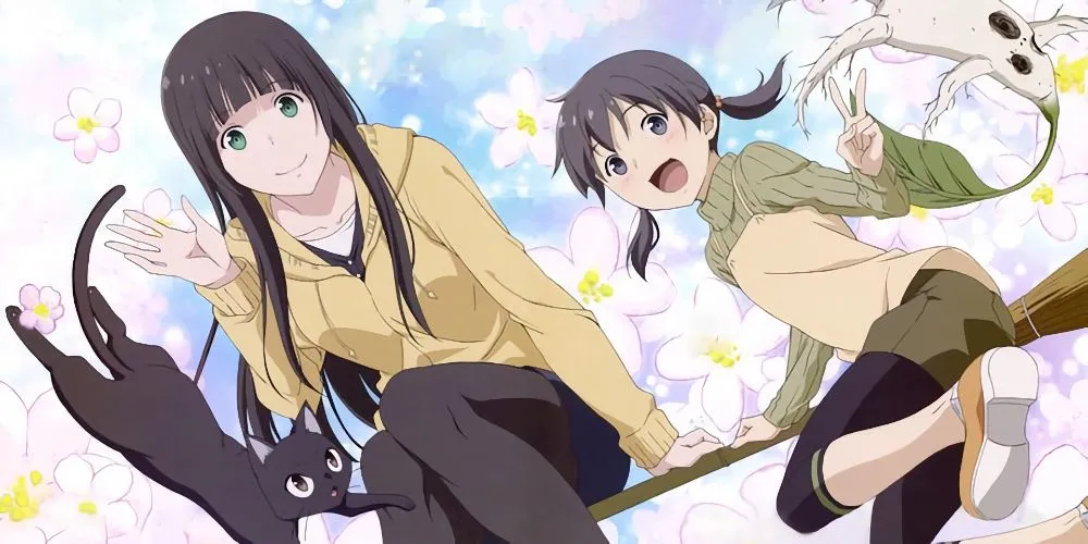Makoto Kowata từ Flying Witch mỉm cười hiền hậu bên chú mèo Chito
