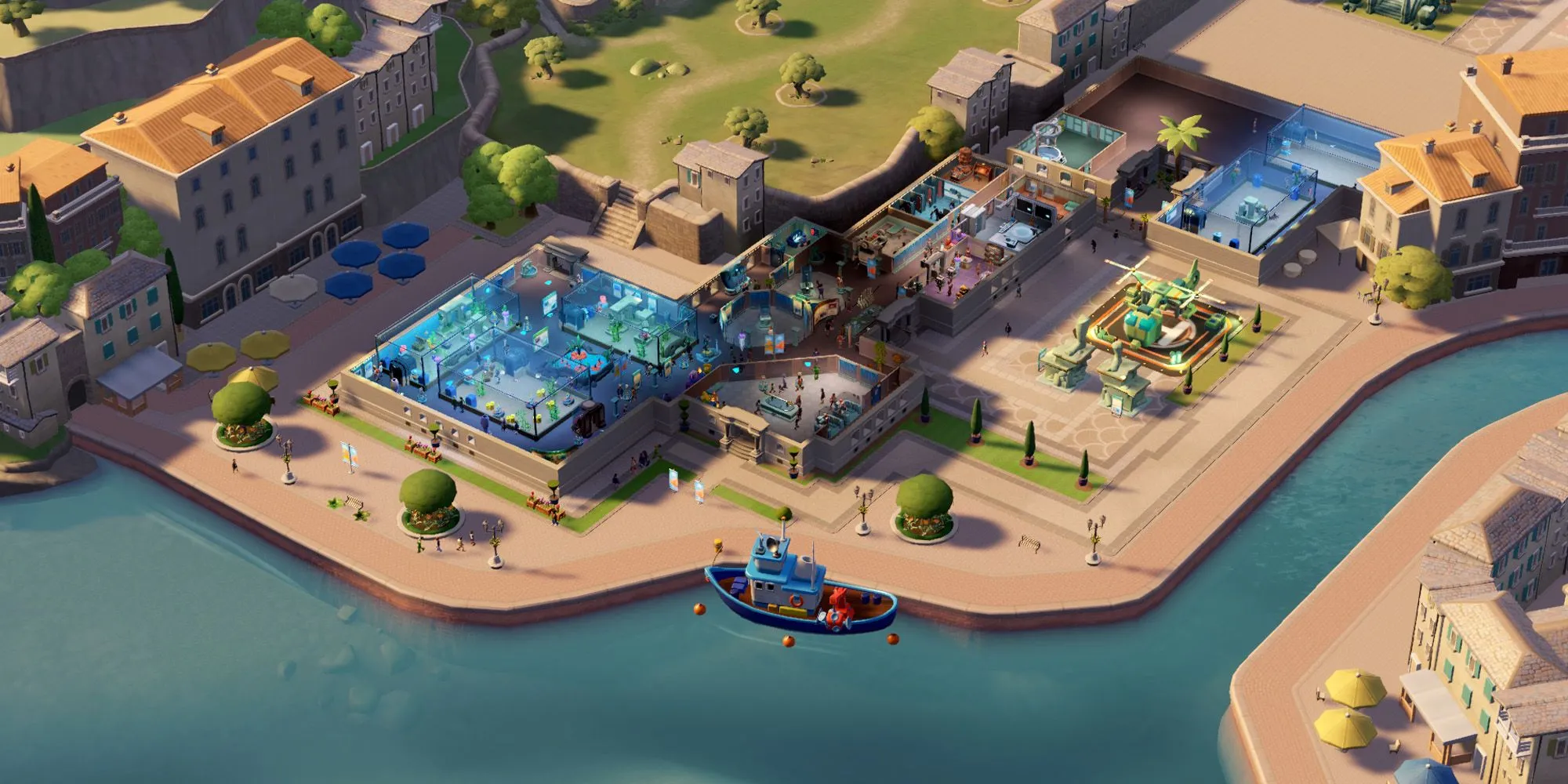 Một khu vực triển lãm ngoài trời tại Passwater Cove trong Two Point Museum với các bể chứa sinh vật biển và lối đi cho khách tham quan.
