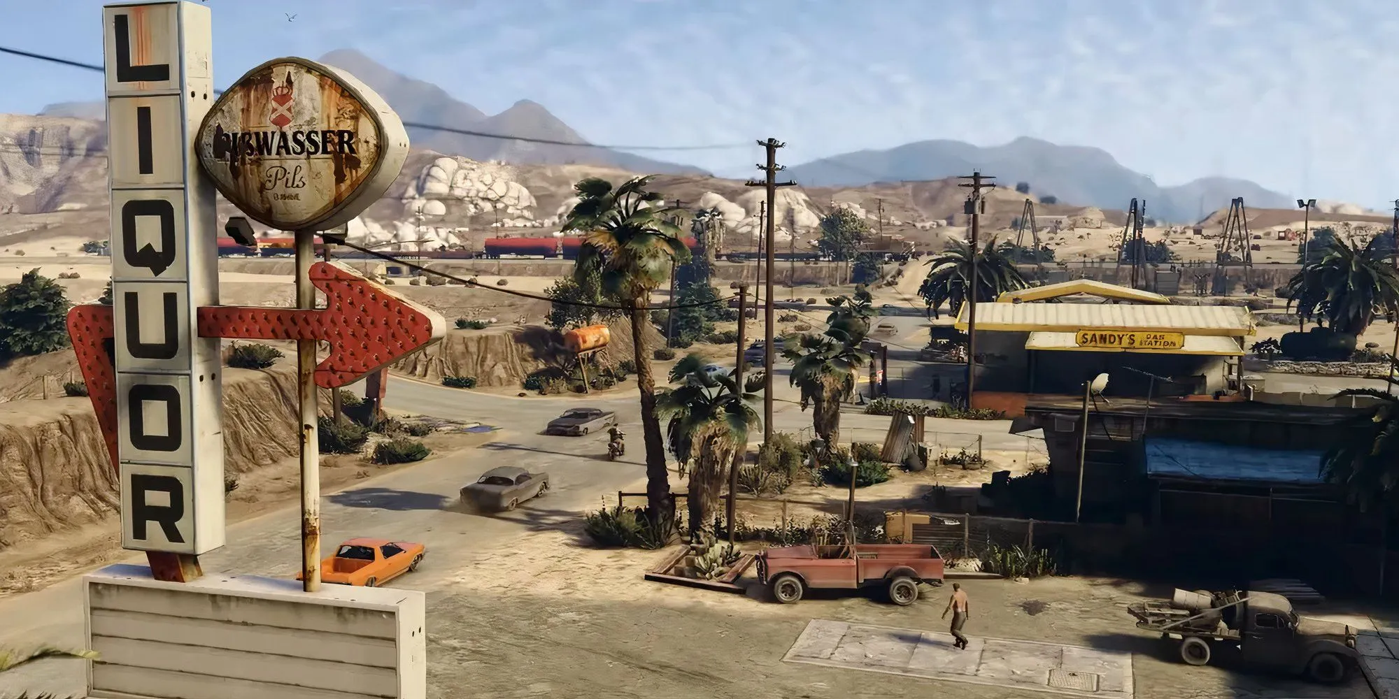 Một khung cảnh sa mạc rộng lớn trong game GTA 5 với những ngọn núi xa xa.