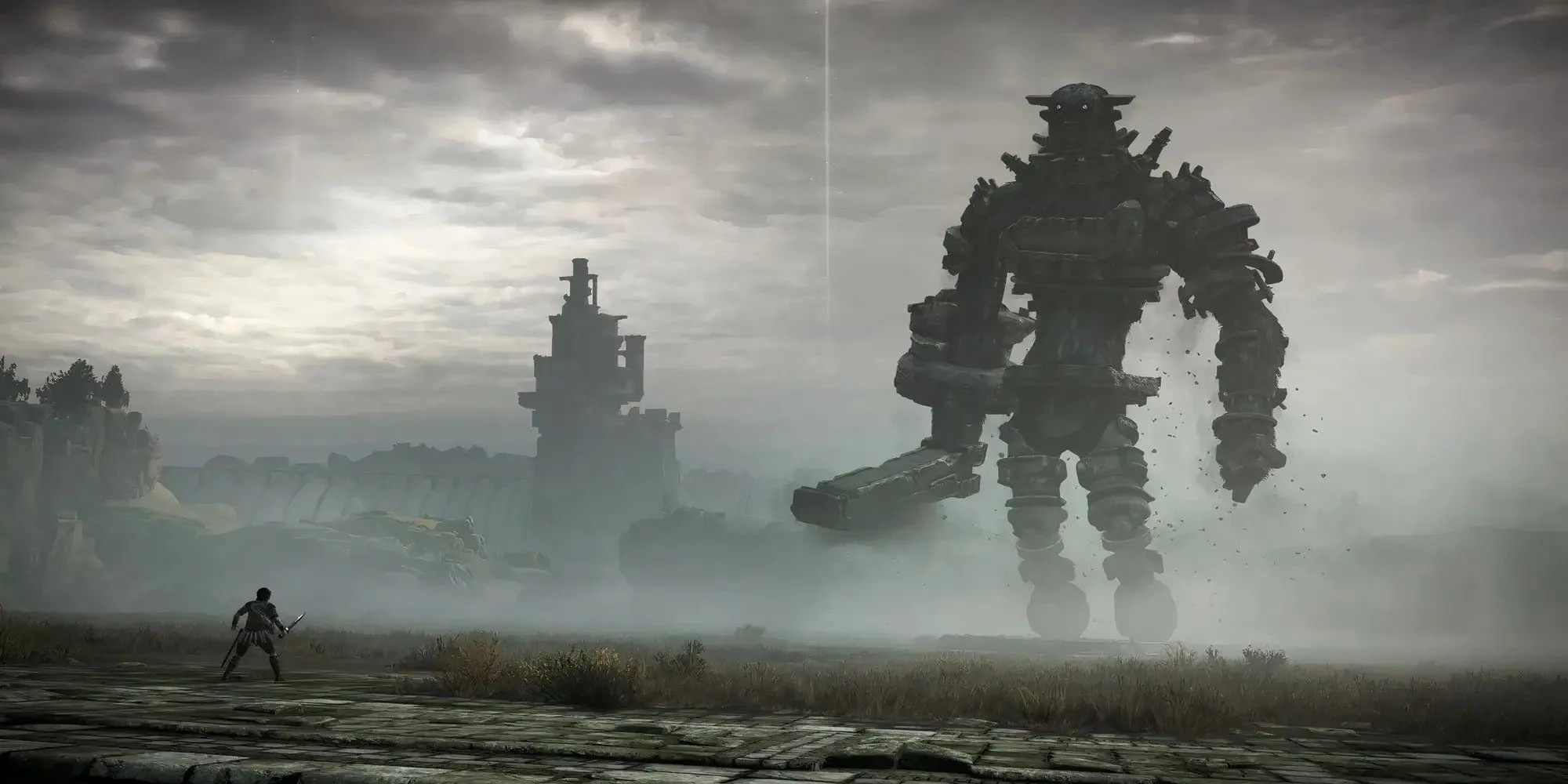 Nhân vật Wander đối đầu với một Colossus khổng lồ trong Shadow of the Colossus