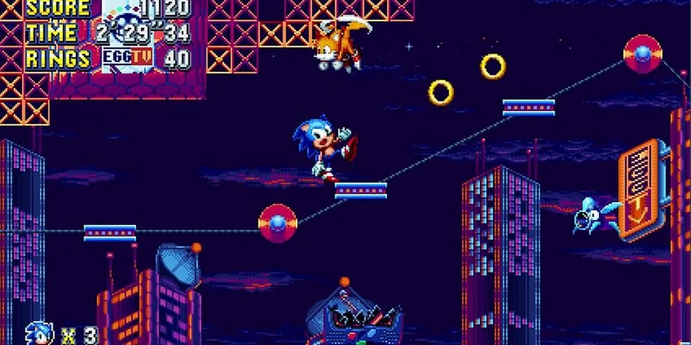 Sonic trong Sonic Mania mất thăng bằng bên rìa một khu vực với thành phố neon phía xa