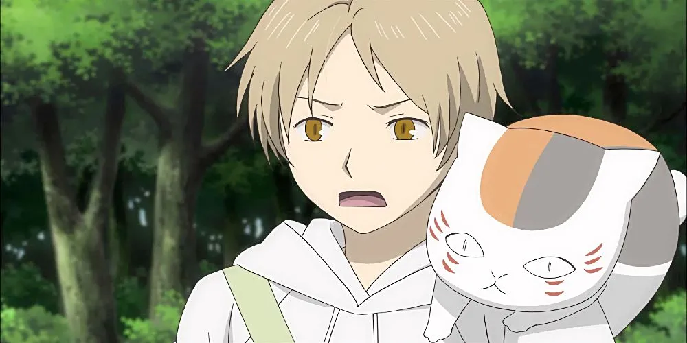 Takashi Natsume và Nyanko-sensei từ Natsume's Book of Friends chia sẻ khoảnh khắc bình yên