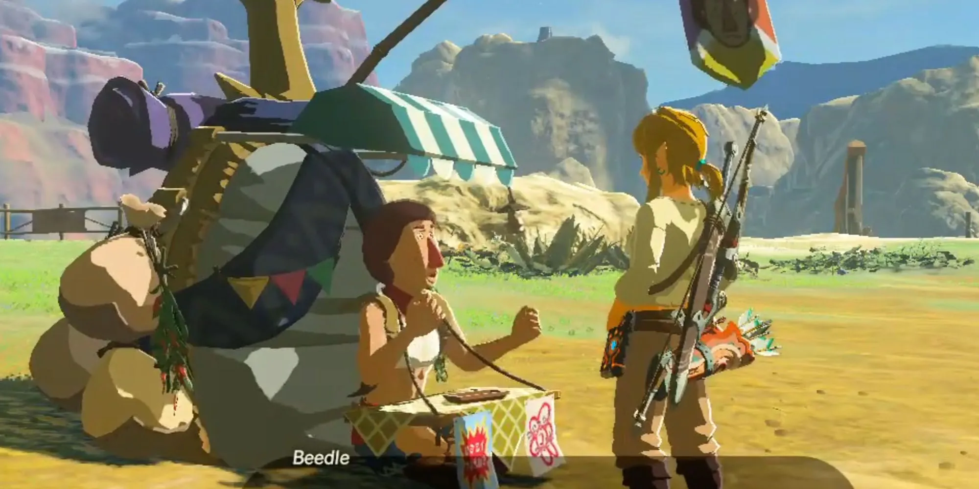 Beedle, người bán hàng rong lưng còng với cái túi hình bọ cánh cứng, đang đứng bán hàng trong The Legend of Zelda Breath of the Wild