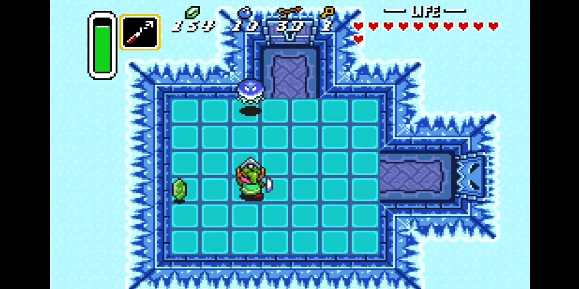 Link di chuyển trên sàn băng trơn trượt trong Ice Palace của Zelda A Link to the Past