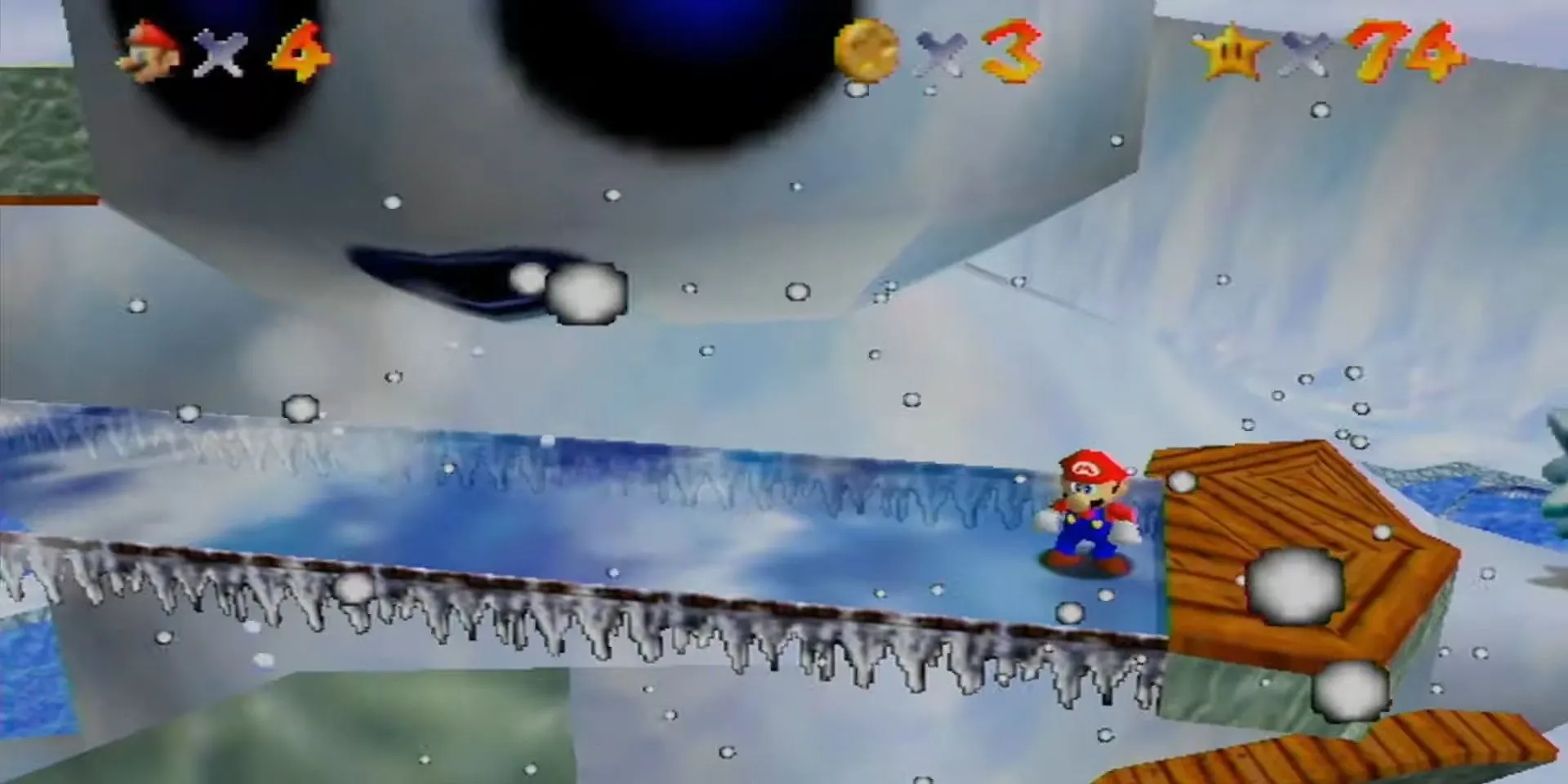 Mario né luồng gió từ người tuyết khổng lồ trong màn Snowman’s Land