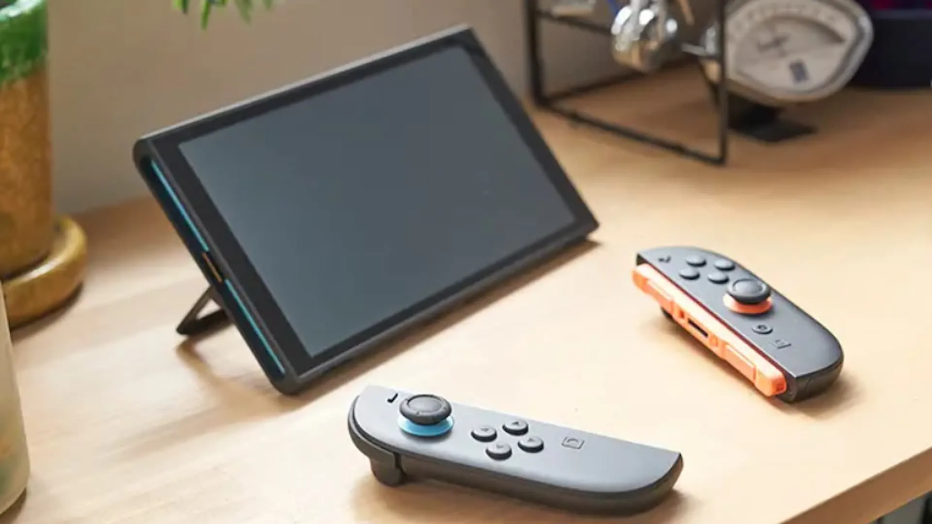 Máy chơi game Nintendo Switch 2 ở chế độ cầm tay hiển thị giao diện game Nintendo 64