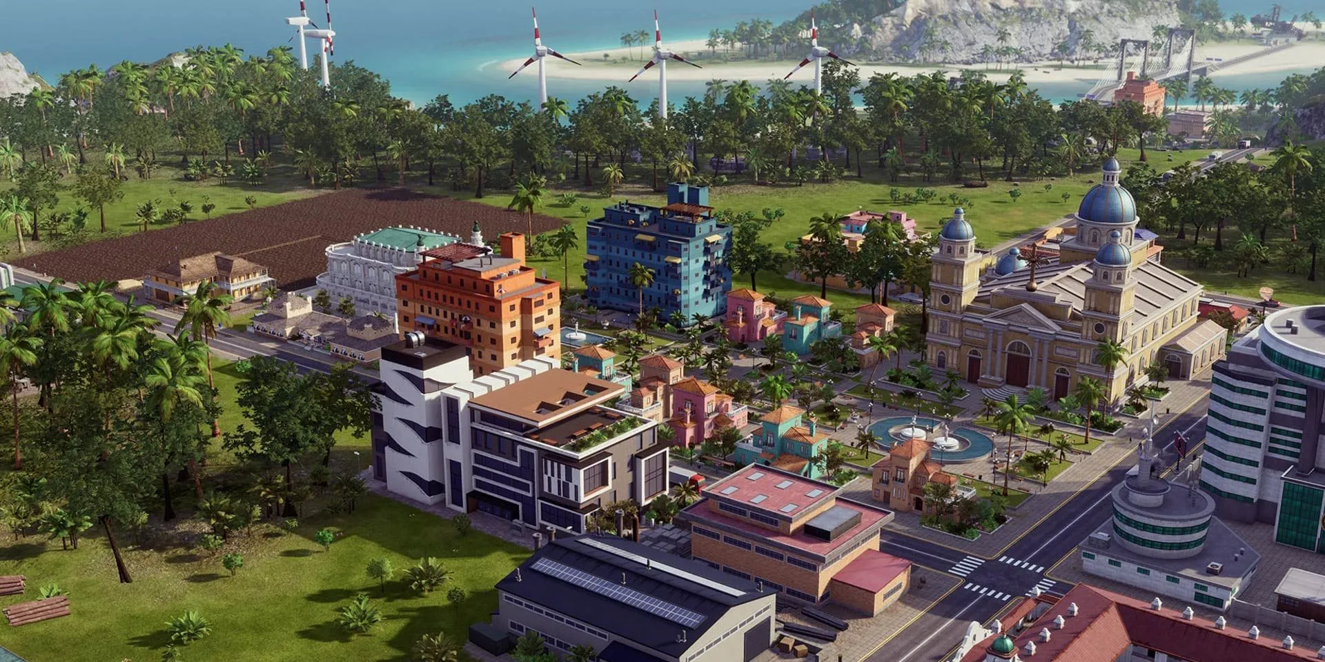 Một thị trấn nhỏ trên đảo với những tòa nhà đầy màu sắc trong Tropico 6, mô phỏng một quốc gia vùng Caribe/Latin.