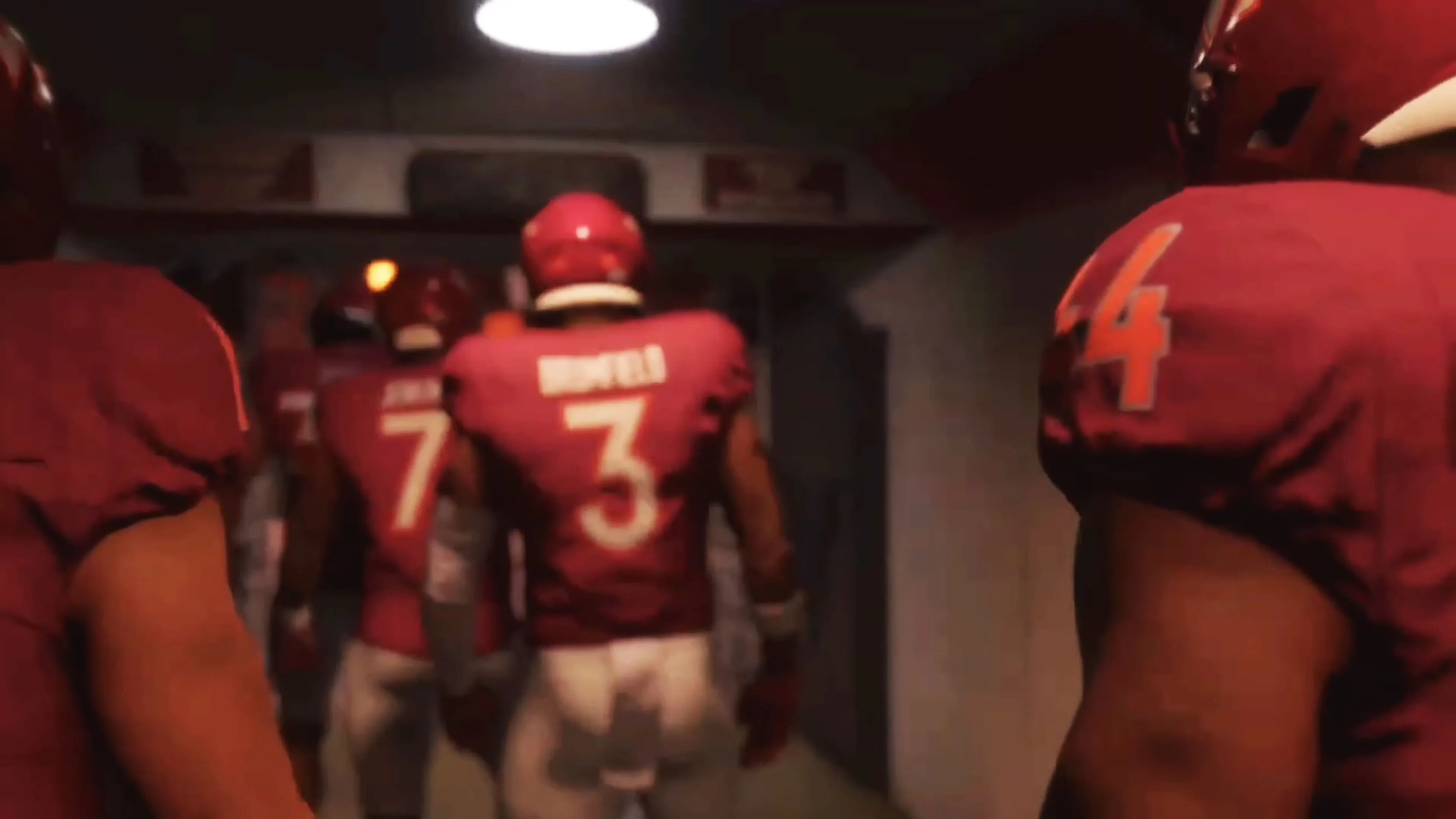 Hình ảnh từ trận đấu trong EA Sports College Football 26, cho thấy chi tiết mô hình cầu thủ.