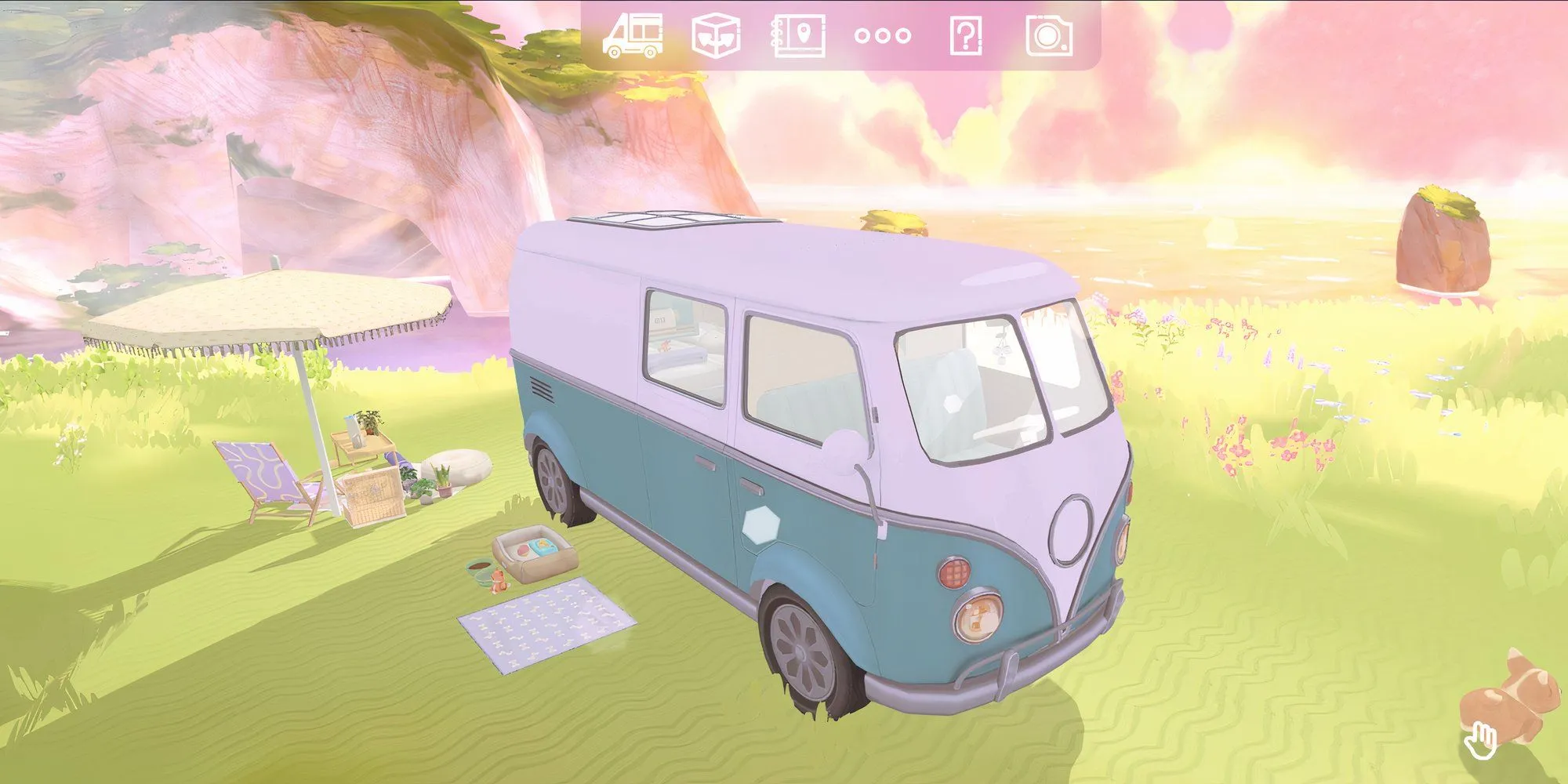 Người chơi đang sắp xếp nội thất xe camper màu xanh bên bờ vách đá trong Camper Van Make it Home