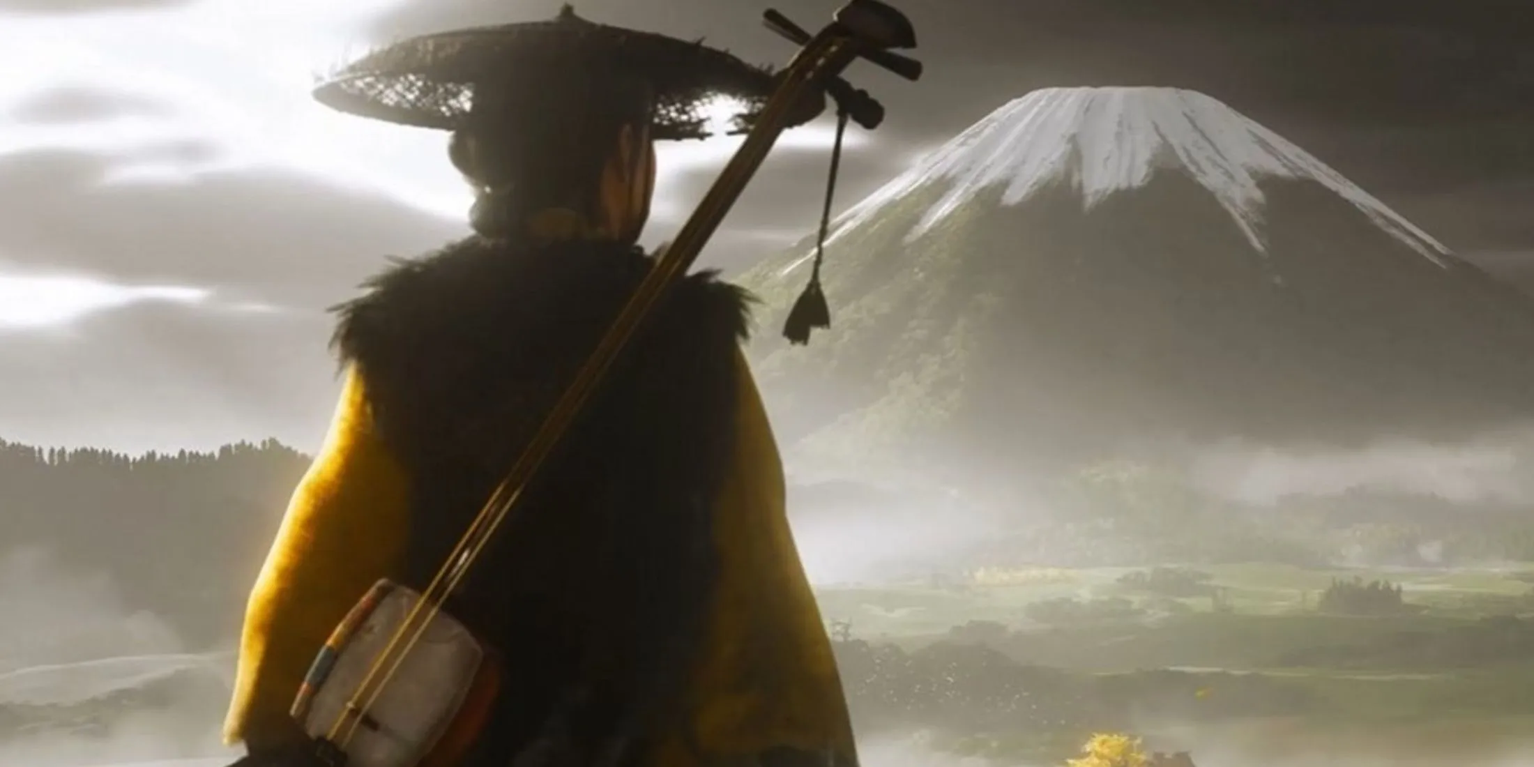 Nhân vật Atsu trong Ghost of Yotei đứng trên núi tuyết, phong cảnh Ezo hùng vĩ