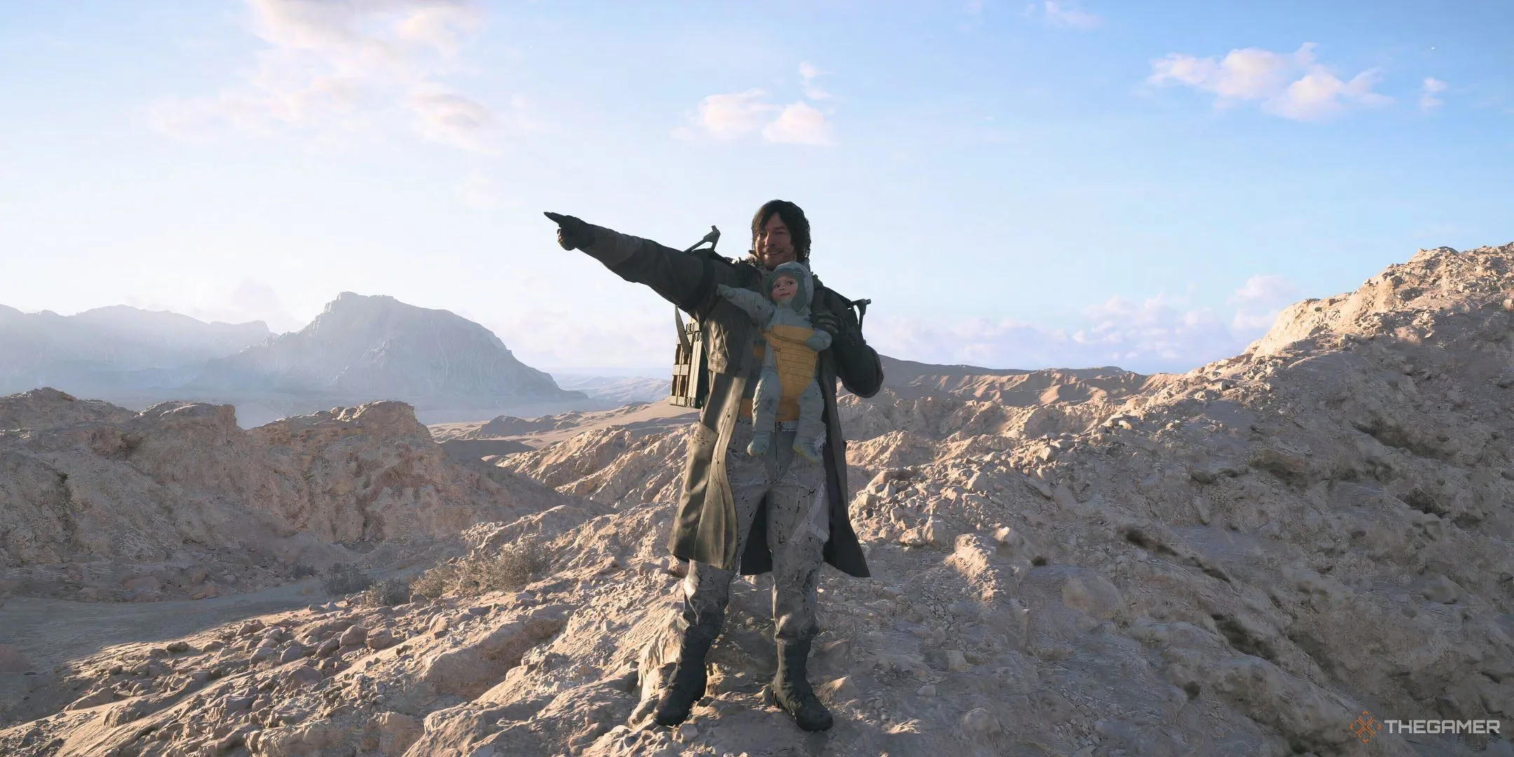 Sam Porter Bridges mặc áo khoác, ôm Lou trong Death Stranding 2: On the Beach, thể hiện sự cô độc trong hành trình.